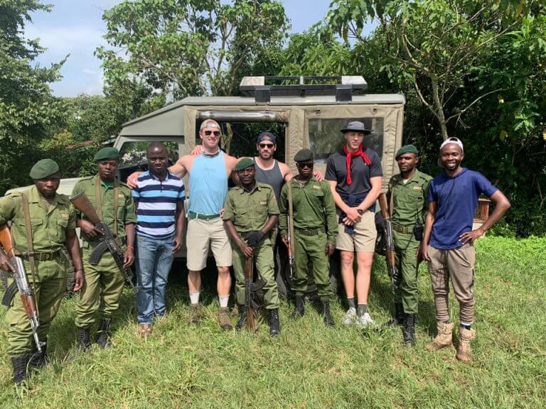 Tourists accompanied with armed rangers