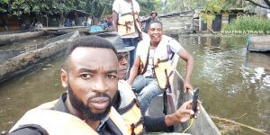 Wooden boat, real local experience, boat cruise, things to do in Kinshasa
