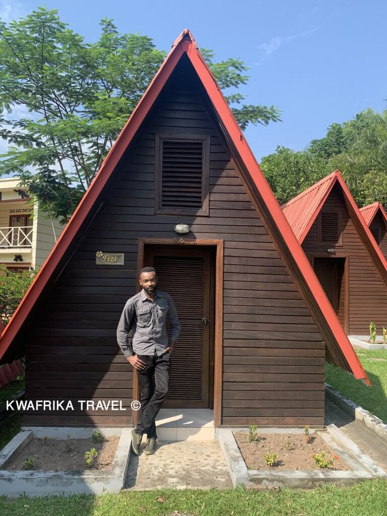 The CEO of Kwafrika Travel in front of Chalet accommodation, Seli Safaris