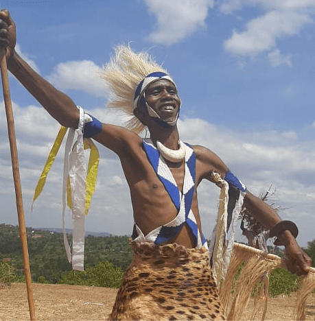 Visit Burundi: A proud Burundian performing the Royal Drums in Gishora